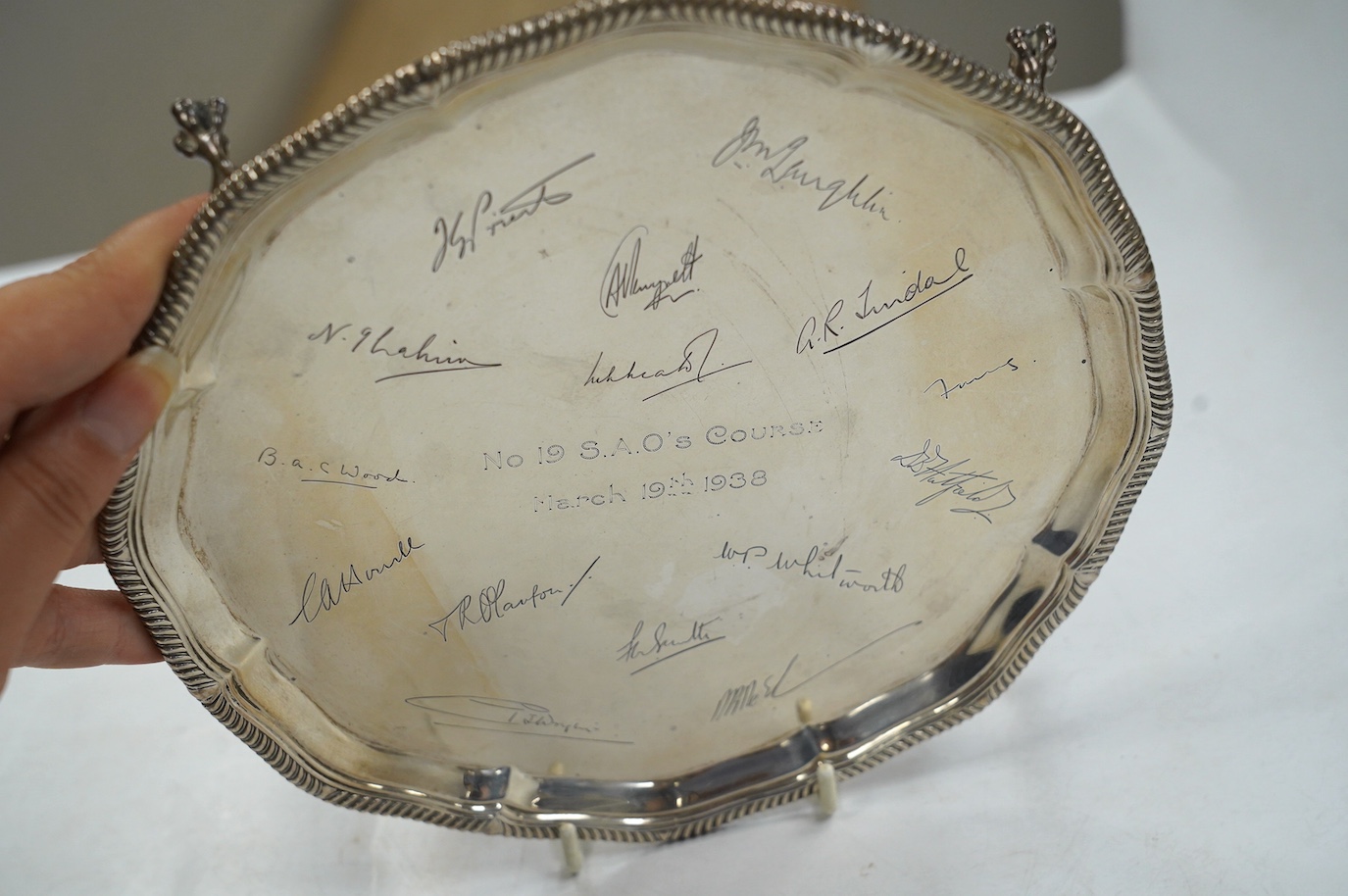 A George VI silver salver, with engraved signatures, by Goldsmith & Silversmiths Co Ltd, London, 1937, 20.7cm, 11.9oz. Condition - fair